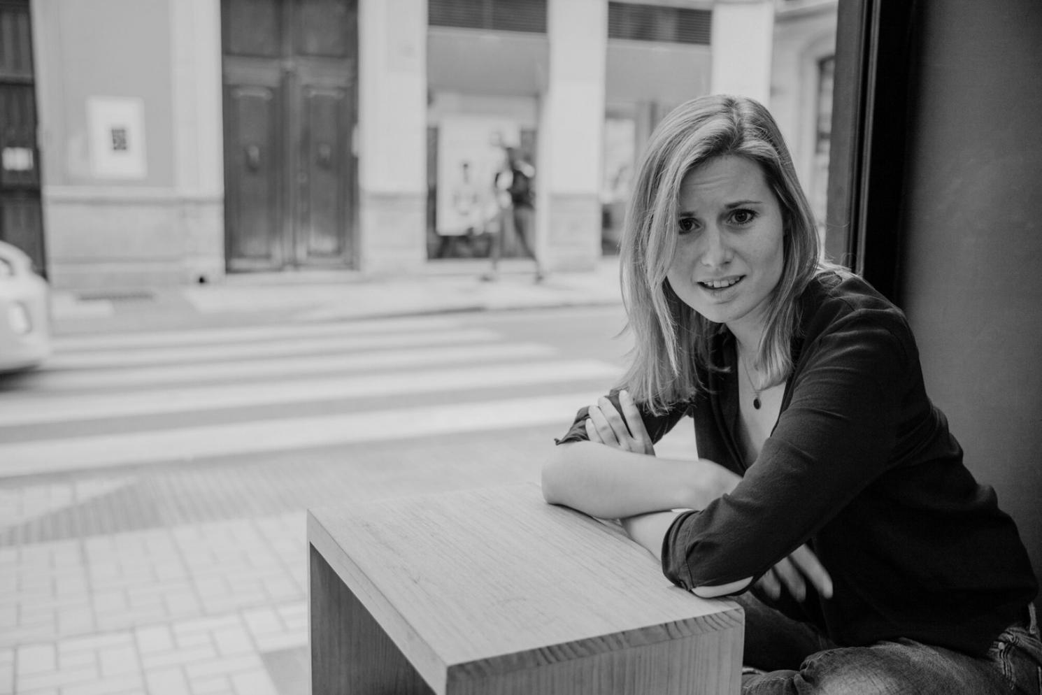 Salle de formation avec participants travaillant sur des projections financières